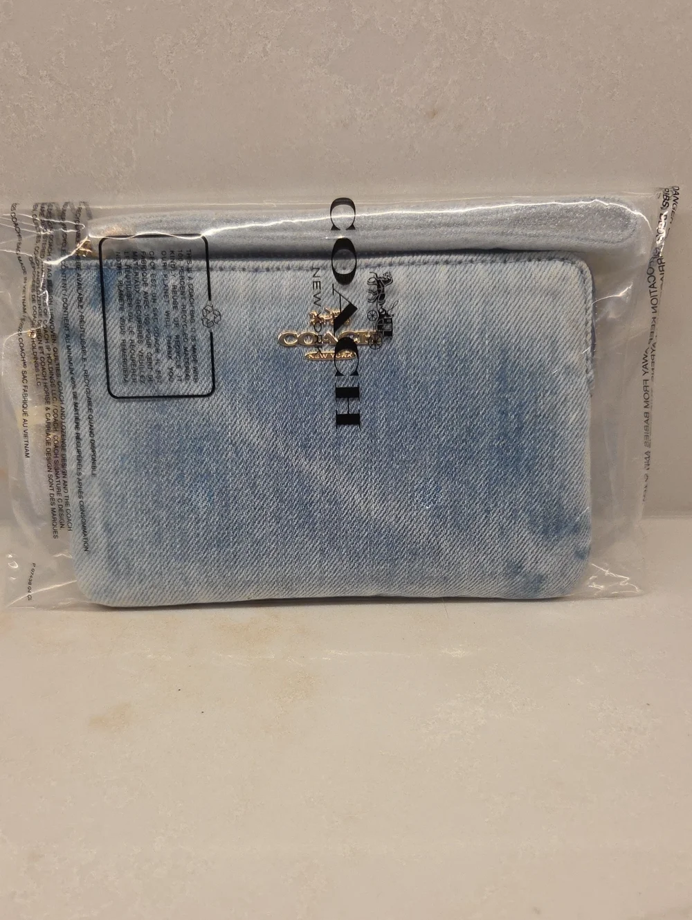 Coach Corner Zip Wristlet in Loved Denim with Charms